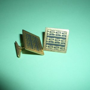 Manschettenknöpfe: Keramik, Gold 750/000