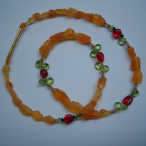 "Kapuzinerkresse"
Feueropal, Peridot, roter Bernstein